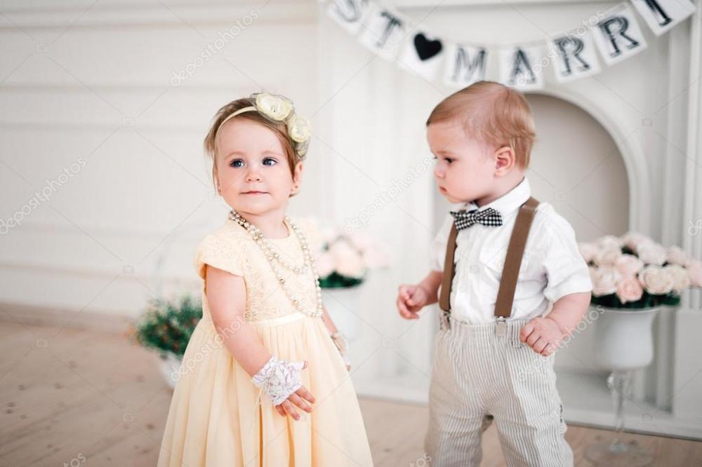 depositphotos_127323320-stock-photo-two-babies-wedding-boy-and.jpg